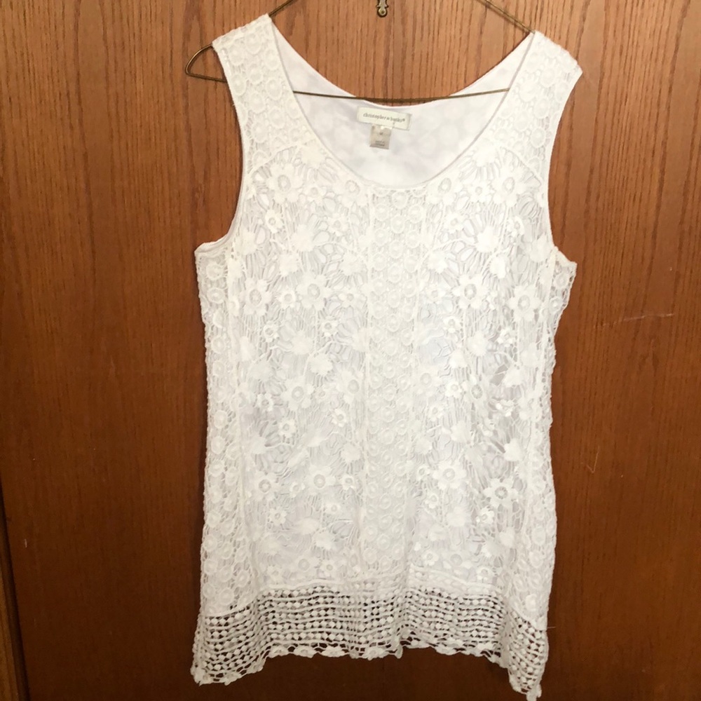 Lace tank top with white liner. Hip length